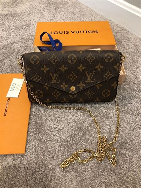 louis vuitton black purse with gold chain|louis vuitton black small purse.